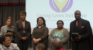Rev. Kelvin Croom of College Hill Baptist Church with, from left, Regina Hughes, Marcie McMullen, Jessica McCaskill, and Willie Robinson.