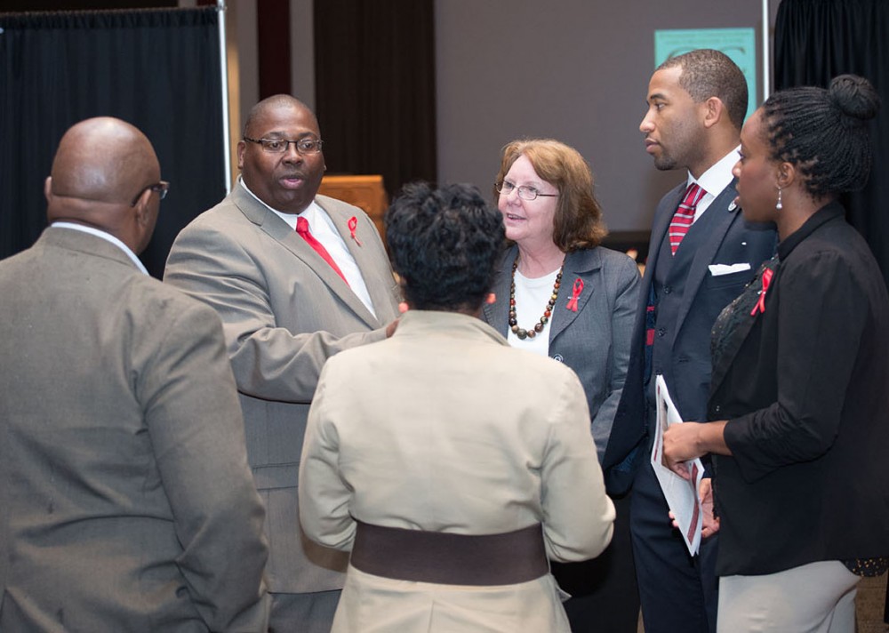 From left, Christopher Spencer, Tommie Syx, Antonio Gardner and Carol Agomo talk with guests at the CCBP Awards program.