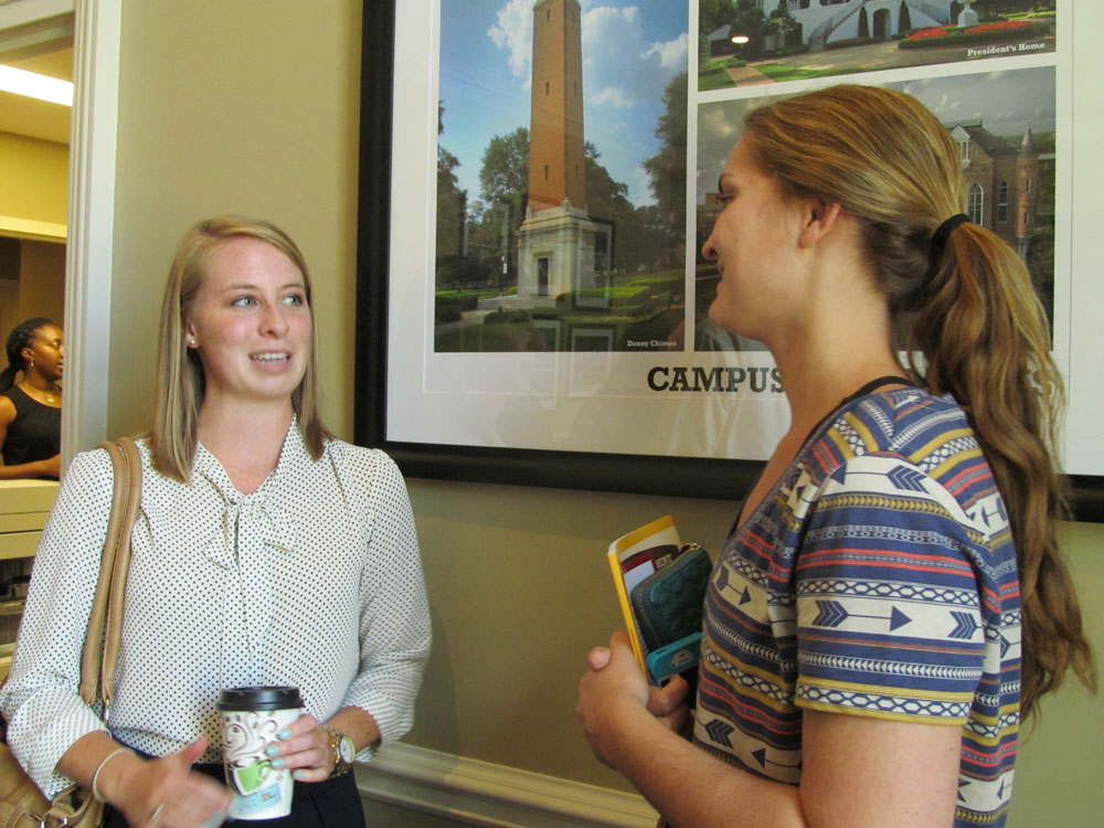 Fulbrighter Rachel Hunkler greets a UA student at the Global Cafe/Fulbright reception.