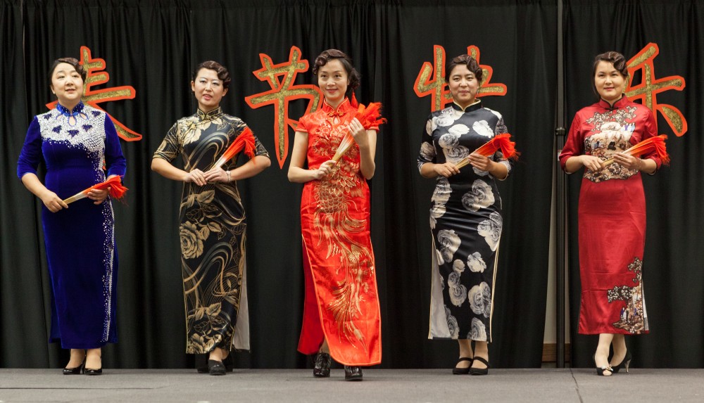 These women are taking part in the Qipao Fashion Walk.