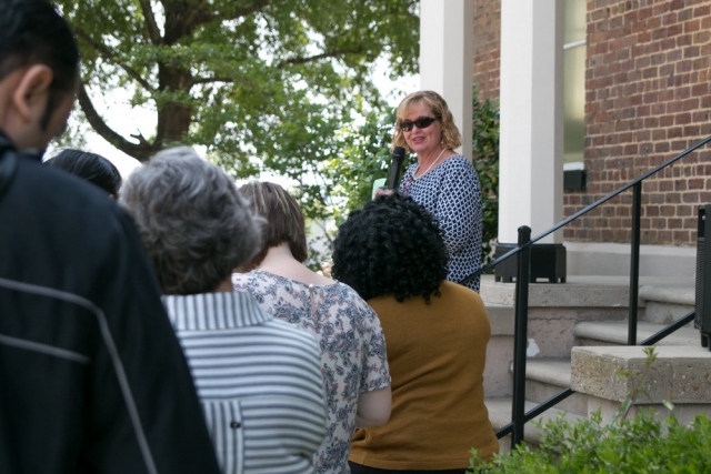 While in Pickens County for a panel discussion on the UA/Pickens County Partnership, which was initiated in 2015 to address health issues and priorities in the county, the tour group made a stop at the Pickens County Courthouse. Here, Patti Fuller speaks to the group from the steps of the courthouse, home to one of Alabama’s famed ghost legends.