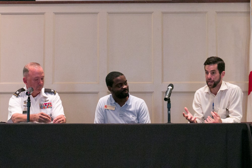From left to right, Col. Ed Passmore, Davis Jackson, and Chris Joiner participate in a panel discussion at the Marion Military Institute Chapel in Perry County. Passmore is the Acting Commandant and Director of the Center for Service Leadership, Marion Military Institute. Joiner is Executive Director of Renaissance Marion, a nonprofit founded to improve the city’s visual effect. Jackson, who served as a site coordinator for the tour, also serves as the coordinator of UA’s 57 Miles Program, named for the distance between The University of Alabama and the community of Marion, where #UA students and faculty are regularly connected with opportunities to address real challenges and draw from the successes of the region, be it through a one-time service trip or a semester-long mentoring program.