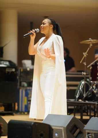 Erica Campbell brings the crowd to its feet in the Realizing the Dream concert.