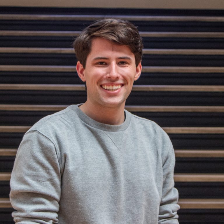 Headshot of Bryan Winkler wearing a gray sweatshirt