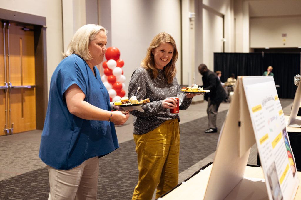 Participants checking out other poster presentations