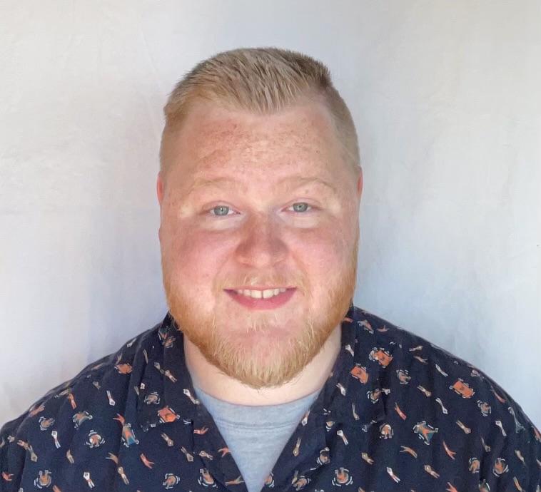 Headshot of Wesley Clay Richmond wearing a patterned collared shirt