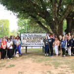 Group picture in front of the Safe House Black History Museum in Greensboro, Alabama