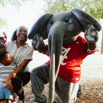 Big Al Posing with a mom and her daughter