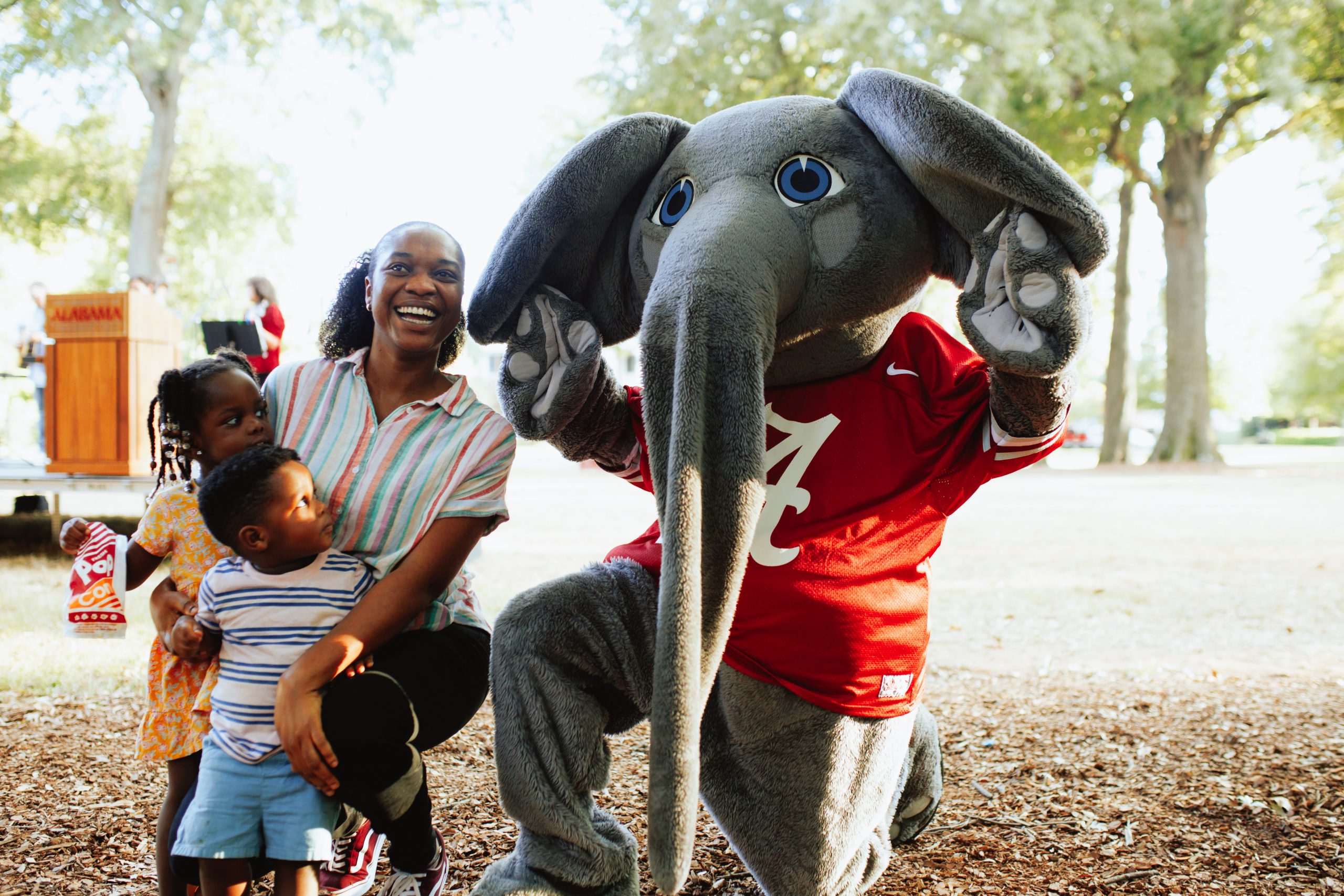 Big Al Posing with a mom and her daughter