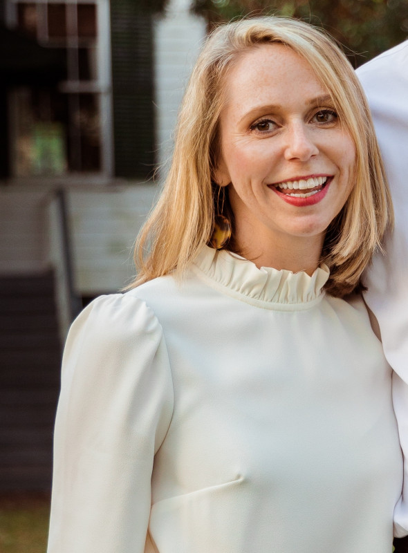 Headshot of Julia James Shreve wearing a off-white blouse