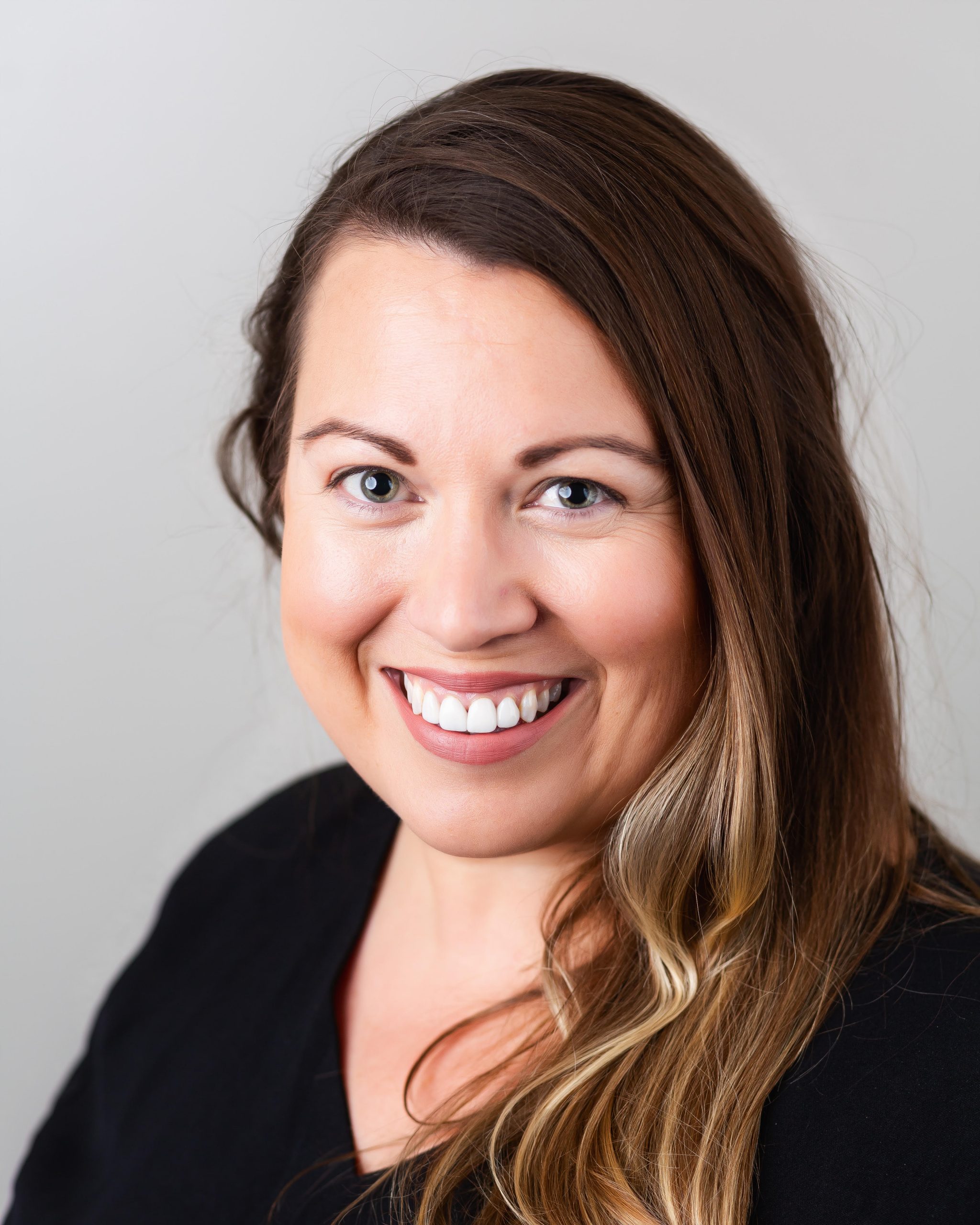 Headshot of Jessica Sanders Walker wearing a black blouse