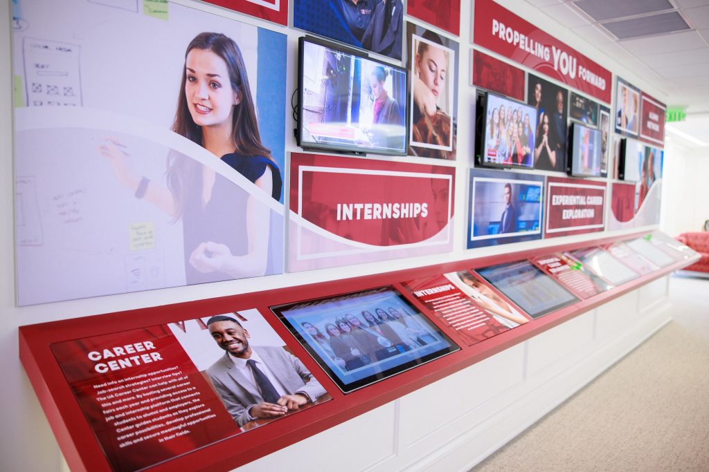 Display wall at The Catherine and Pettus Randall Welcome Center at The University of Alabama